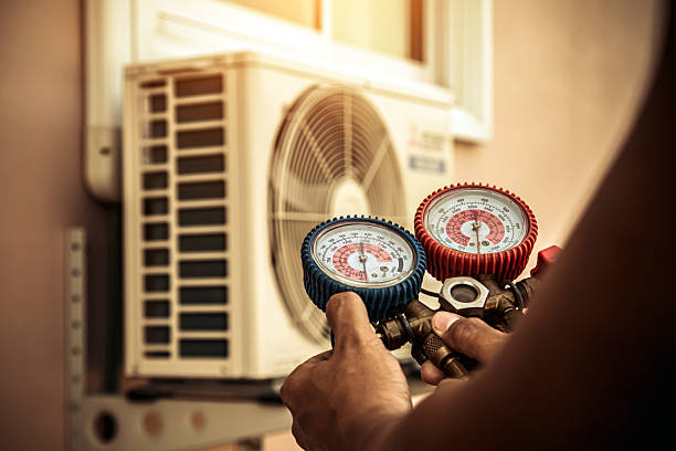 Professional Hvac technician working in Baker, FL